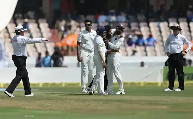 India captain Virat Kohli was seen trying to avoid the man’s hug as the security personnel came and whisked him away.