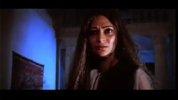 Simi Garewal in a still from <i>Karz</i>.