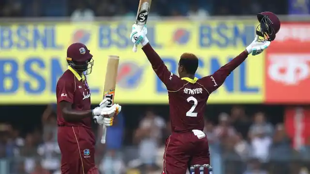 Shimron Hetmyer after reaching his century against India on Sunday at Guwahati. 