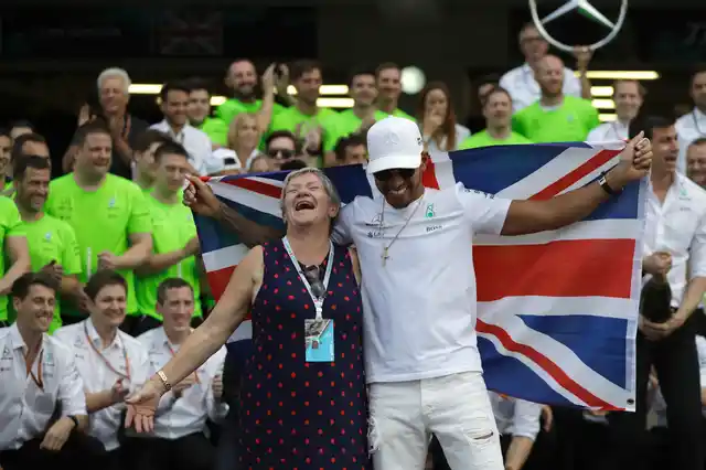 Mercedes driver Lewis Hamilton celebrates with his mother Carmen Larbalestier at the pit lane after the Formula One Mexico Grand Prix auto race at the Hermanos Rodriguez racetrack in Mexico City, Sunday, Oct. 29, 2017.