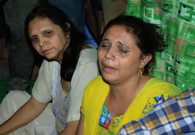 Kin of those injured or killed in the accident wait to hear news about their family.