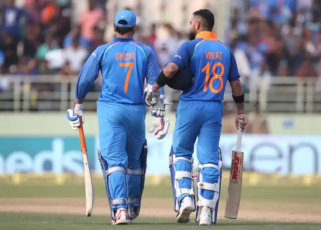 MS Dhoni and Virat Kohli pictured during India’s 2nd ODI against West Indies at Visakhapatnam.