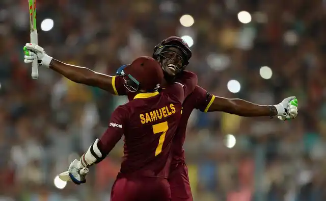 Carlos Brathwaite and Marlon Samuels celebrate after winning the 2016 ICC World T20.