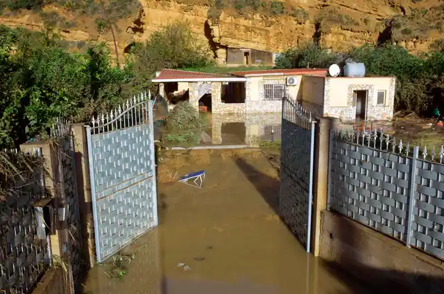 The flooded house.