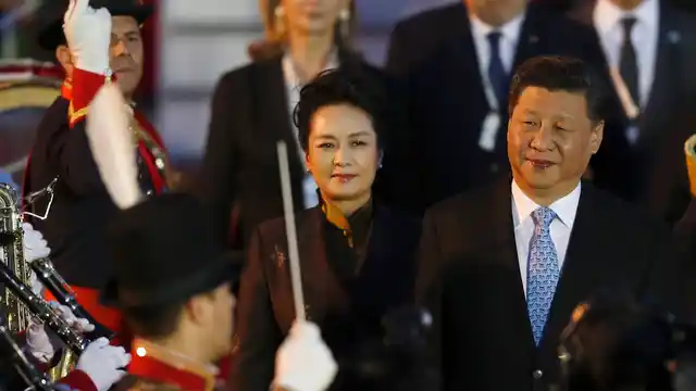China’s President Xi Jinping and first lady Peng Liyuan arrive at the Ministro Pistarini international airport in Buenos Aires, Argentina.
