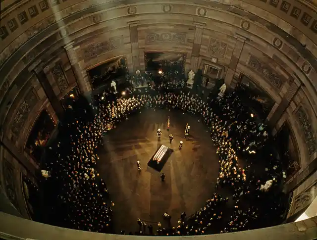 John F Kennedy’s coffin lies in state beneath the Capitol’s dome, November 1963.