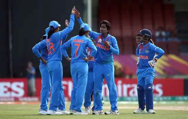 India rejoice at the fall of a New Zealand wicket during their WT20 opener in Guyana