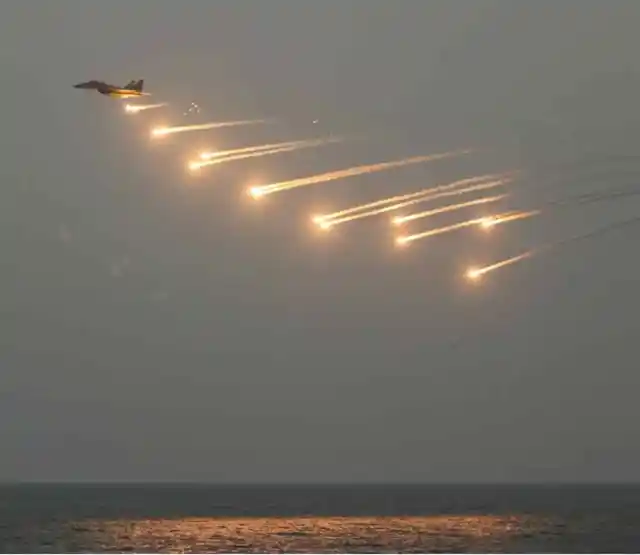 A MiG 29K lights up the Vizag sky with flares.