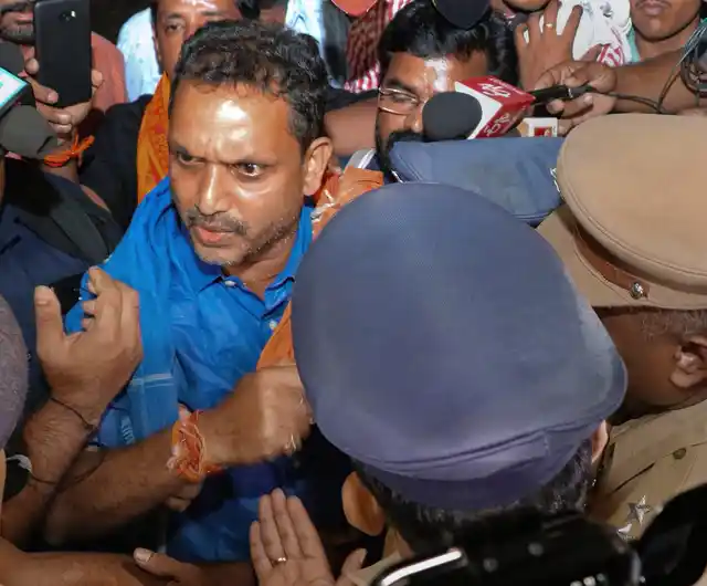 BJPs Kerala state general secretary K Surendran being taken into preventive detention near Sabarimala on Saturday, 17 November.