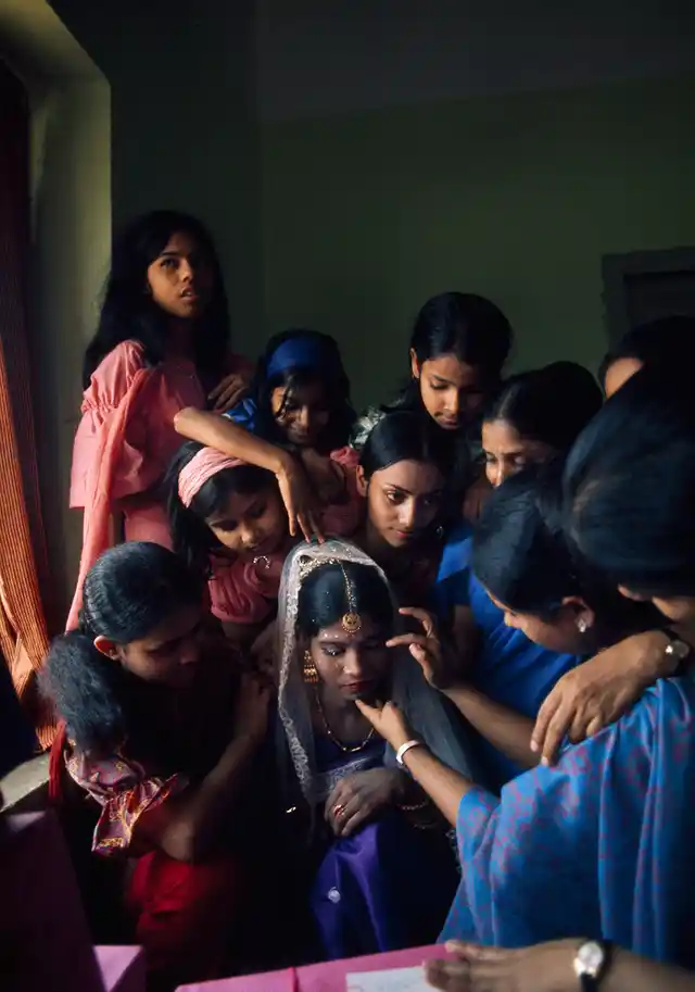 Wealthy Muslims examine the wedding finery of a bride in Dhaka, Bangladesh, 1972.