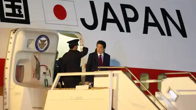 Japan’s Prime Minister Shinzo Abe arrives at the Ministro Pistarini international airport in Buenos Aires, Argentina.
