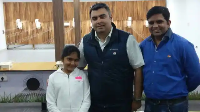 Esha Singh with Olympic medallist Gagan Narang (centre).