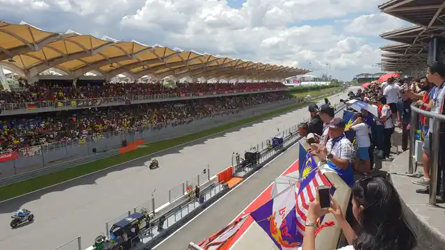 Watching the Malaysian Moto GP live from the stands.