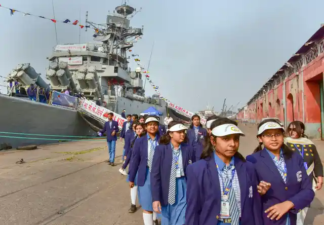 School students visit Navy warship of eastern fleet INS Kirch as a part of Navy Day celebrations, at Kolkata Port (Khidirpur Dock). 