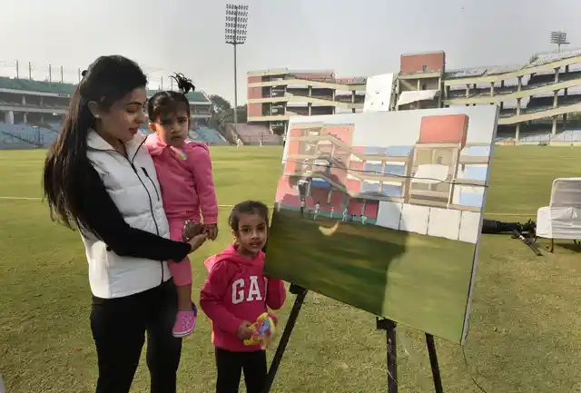Gautam Gambhir’s wife Natasha and daughters with a painting by Saif.