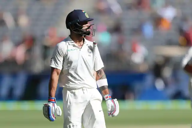 Virat Kohli walks off after being dismissed in India’s second innings during the Perth Test against Australia.