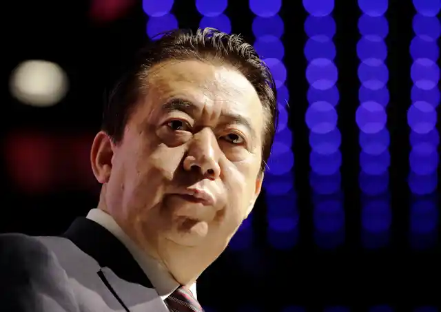 In this 4 July 2017 photo, Interpol President Meng Hongwei delivers his opening address at the Interpol World congress, in Singapore. 