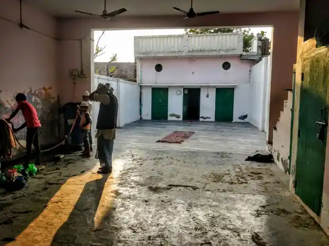 Young boys just after the afternoon namaaz at the mosque in Nayabans village.