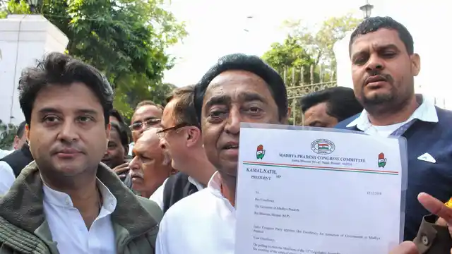 Kamal Nath and Jyotiraditya Scindia flash the letter they submitted to governor Anandiben Patel to stake claim on government formation.