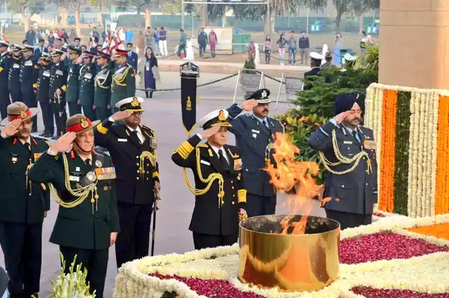 Chiefs of the Indian Army, The Indian AirForce and the Indian Navy pay homage at the Amar Jawan Jyoti, India Gate on the occasion of Navy Day. 