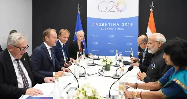 Prime Minister Narendra Modi meeting Jean-Claude Juncker and Donald Tusk, in Buenos Aires, Argentina.