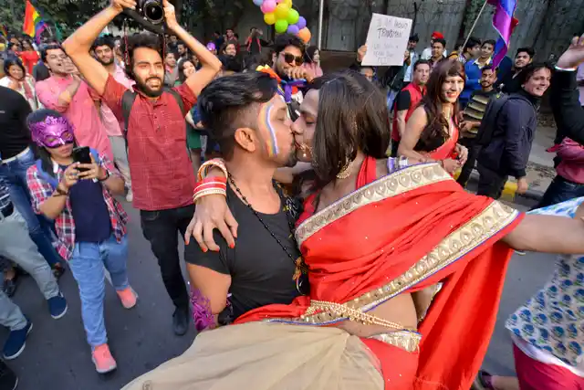 A couple kiss during the Delhi Pride Parade, held in November 2018.