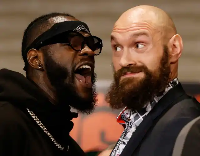 Boxers Deontay Wilder, left, and Tyson Fury exchange words as they face each other at a news conference in Los Angeles, Wednesday, Nov. 28, 2018. The pair are slated to fight Saturday night for Wilder’s WBC heavyweight title. 