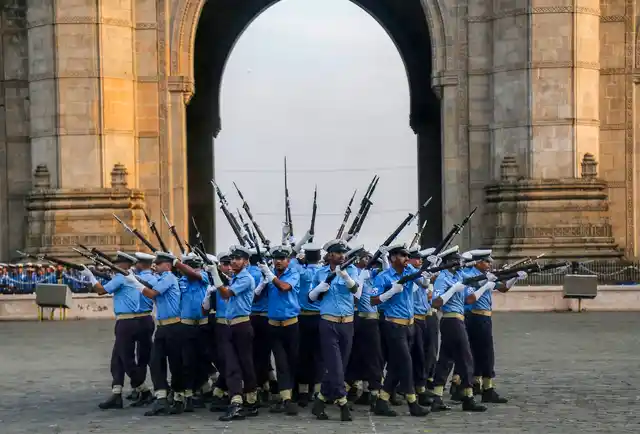 Indian Navy personnel rehearse ahead of the Navy Day Celebration, at Gateway of India, in Mumbai, on 28 November 2018. 