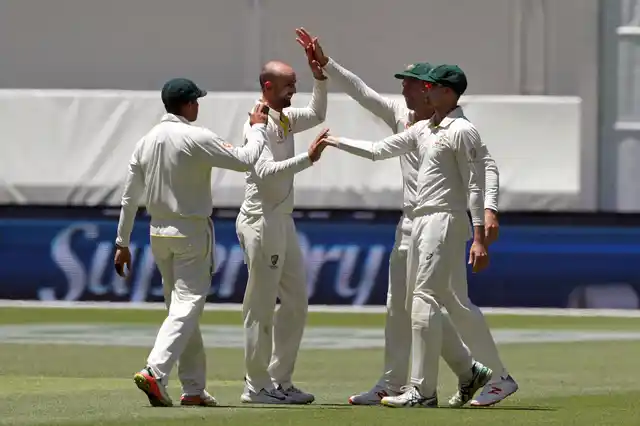 Australian players celebrate the dismissal of India’s Rishabh Pant during play in the second cricket test between Australia and India in Perth, Australia on Tuesday, Dec. 18.