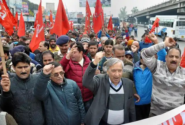 CPI(M) Secretary MY Tarigami with Centre of Indian Trade Union (CITU) activists raise slogans during the 48-hour long nationwide general strike called by Central trade unions protesting against the “anti-people” policies of the Centre, in Jammu.