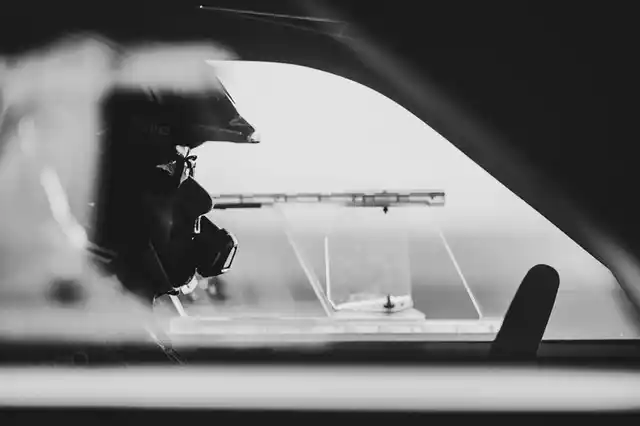 A participant is clicked through his car window as he prepares to launch himself into the tarmac.
