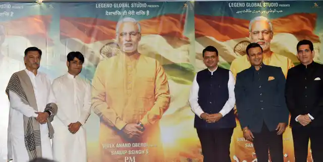 Producer Sandip Ssingh, Vivek Oberoi and director Omung Kumar with Maharashtra CM Devendra Fadnavis at the Modi biopic poster launch.