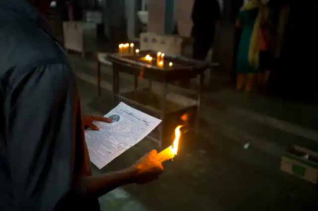 In this Saturday, 4 November, 2018, photo, a devotee prays at St. Mary’s Church in Kottayam.