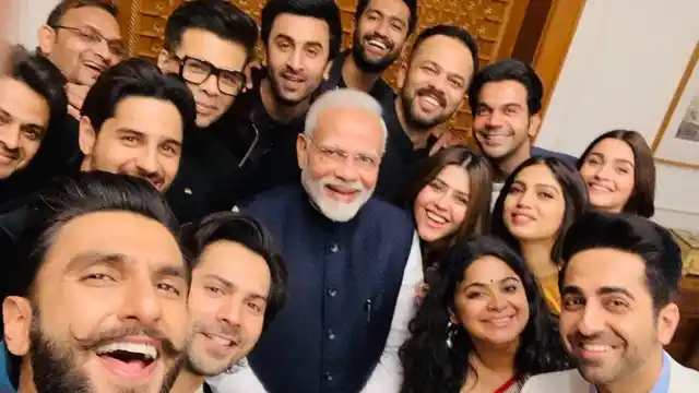 Prime Minister Narendra Modi in a selfie with Bollywood directors Karan Johar, Ashwiny Iyer, Rohit Shetty, Ekta Kapoor and actors Ranveer Singh, Bhumi Pednekar, Vicky Kaushal, Ranbir Kapoor, Alia Bhatt, Ayushmann Khurrana, Varun Dhawan, Sidharth Malhotra, Rajkummar Rao and others after their meeting, in New Delhi on Thursday, 10 January, 2019. 