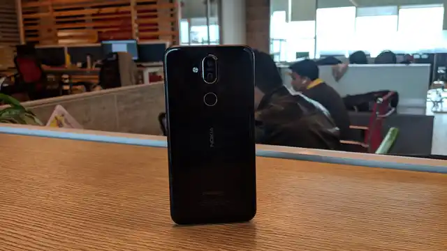The back body of the Nokia 8.1 is made of glass.