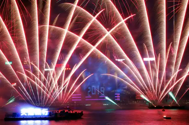 Fireworks explode over the Victoria Harbor during New Year’s Eve to celebrate the start of year 2019 in Hong Kong, on Tuesday, 1 January 2019.