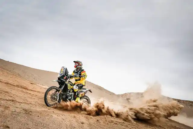 A bike racer takes on the dunes in Peru during the initial stages of the Dakar rally. 