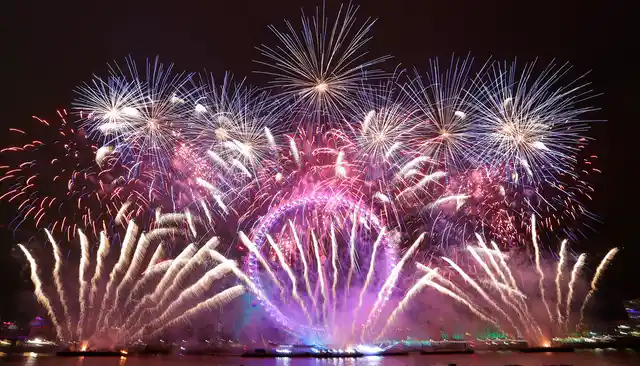 Fireworks explode over the London Eye during the New Year’s eve celebrations after midnight in London, on Tuesday, 1 January 2019.