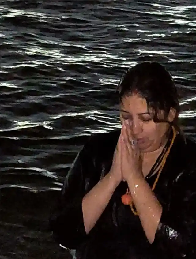 Union minister Smriti Irani takes holy dip at Sangam. 