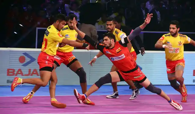 Players in action during a Pro Kabaddi League 2018 match between Bengaluru Bulls and Gujarat Fortunegiants at the Rajiv Gandhi Indoor Stadium in Kochi on Dec 31, 2018.