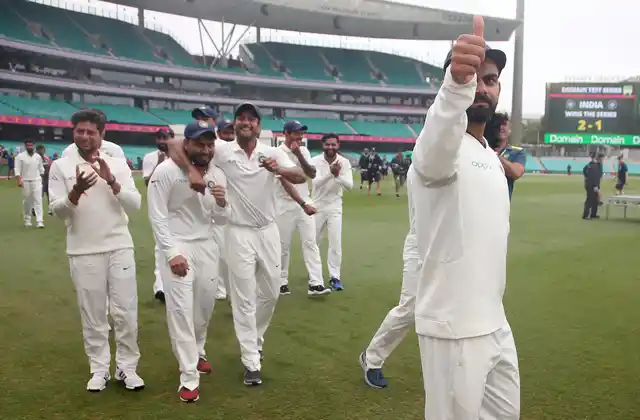 India’s captain Virat Kohli, right, celebrates with teammates after India’s series win when play was called off on day 5 of their cricket test match in Sydney, Monday, Jan. 7, 2019. The match is a draw and India wins the series 2-1.