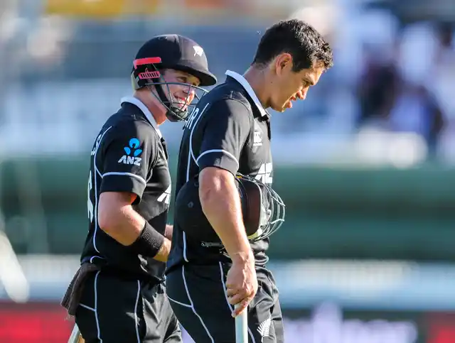 New Zealand’s Ross Taylor, right, and Henry Nicholls celebrate the win over India during their fourth one day international at Seddon Park in Hamilton, New Zealand, Thursday, Jan. 31, 2019.