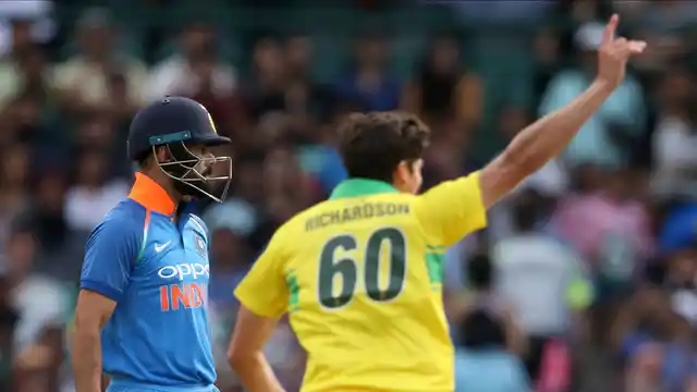 Australia’s Jhye Richardson (right) celebrate the fall of Virat Kohli’s wicket in Sydney on Saturday, Jan 12, 2019. (AP Photo/Rick Rycroft) 