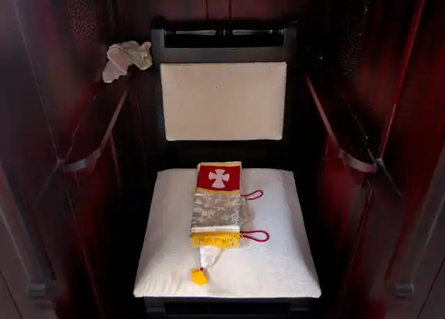 In this Saturday, 3 November, 2018, photo, a maniple or armband of a Catholic priest is placed on the chair of a confession box in a church in a village Goolikadavu.