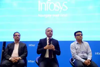 Bengaluru: Infosys CEO Salil Parekh accompanied by COO U.B. Pravin Rao and Interim CFO Jayesh Sanghrajka, addresses during a press conference to announce the company