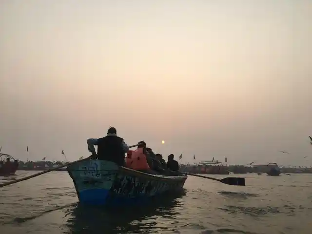 Devotees take a dip in river Ganga in Kumbh mela.