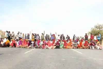 Ajmer: People belonging to Gujjar community stage a demonstration on National Highway (NH) 58 to demand five per cent reservation in jobs and educational institutions, in Ajmer, Rajasthan on Feb 10, 2019. (Photo: Shaukat Ahmed/IANS)
