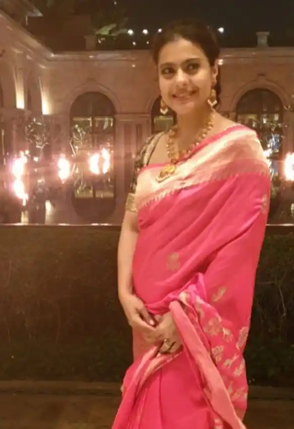 Kajol looked gorgeous in a pink saree.
