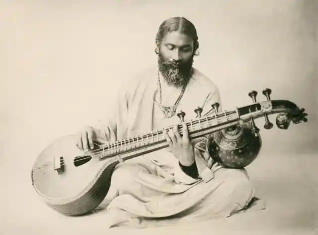 Inayat Khan playing the veena. 
