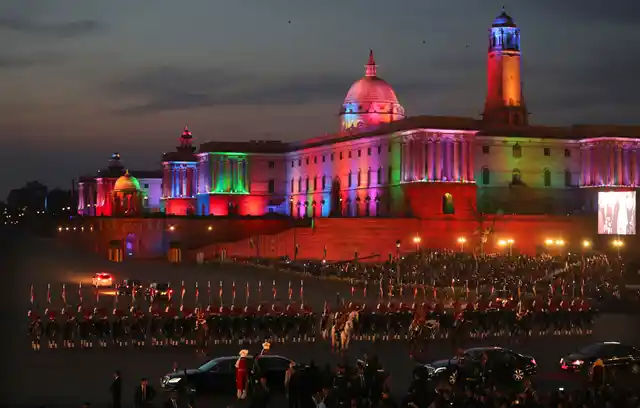 President Ram Nath Kovind’s convoy leaves, escorted by horse-mounted presidential bodyguards, past the illuminated north and south blocks, at the end of the Beating Retreat ceremony on Tuesday, 29 January. The ceremony marks the end of the annual Republic Day festivities. 
